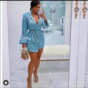 Aqua dress/ robe with gold trimming and feathers at end of sleeve